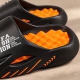 Close-up of the orange massage footbed and moulded black rim