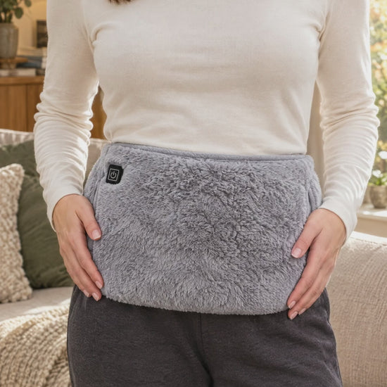 TummySoothe heated belt: wearing demonstration, button close-up and hand pocket